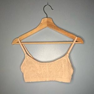 SKIMS light creamy tan color